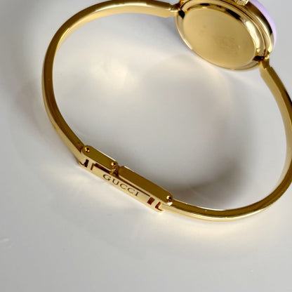 Gucci 1990s Interchangeable Bezel Gold Plated Bangle Watch with 12 bezels, case