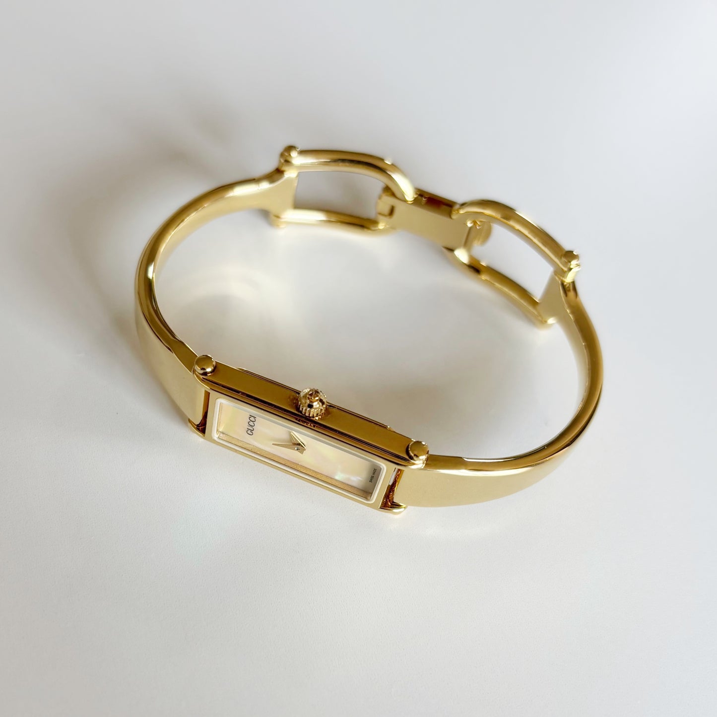 Gucci 1990s Seashell Rectangular Dial Gold Plated Bangle Watch