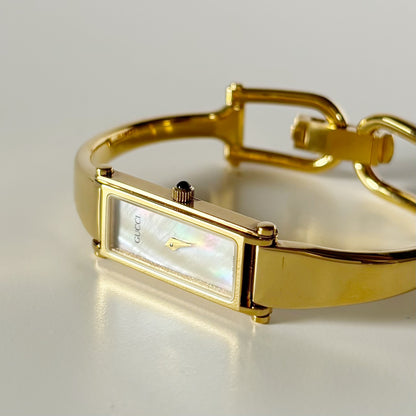 Gucci 1990s Seashell Rectangular Dial Gold Plated Bangle Watch