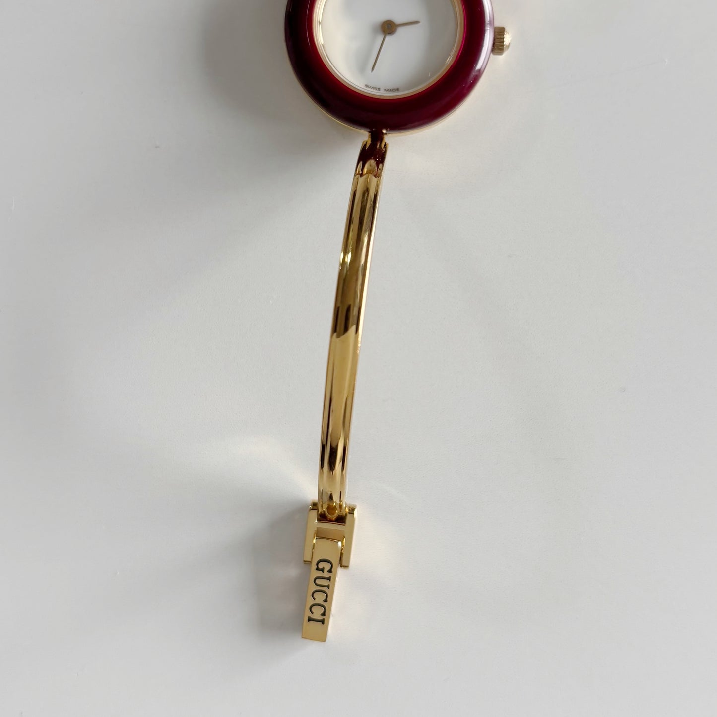 Gucci 1990s Interchangeable Bezel Gold Plated Bangle Watch with 12 bezels, case