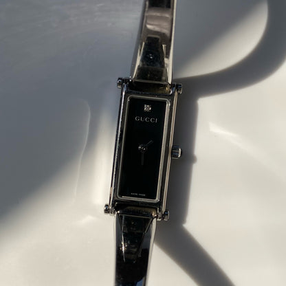 Gucci 1990s Black Dial Stainless steel Silver Rectangular Bangle Watch