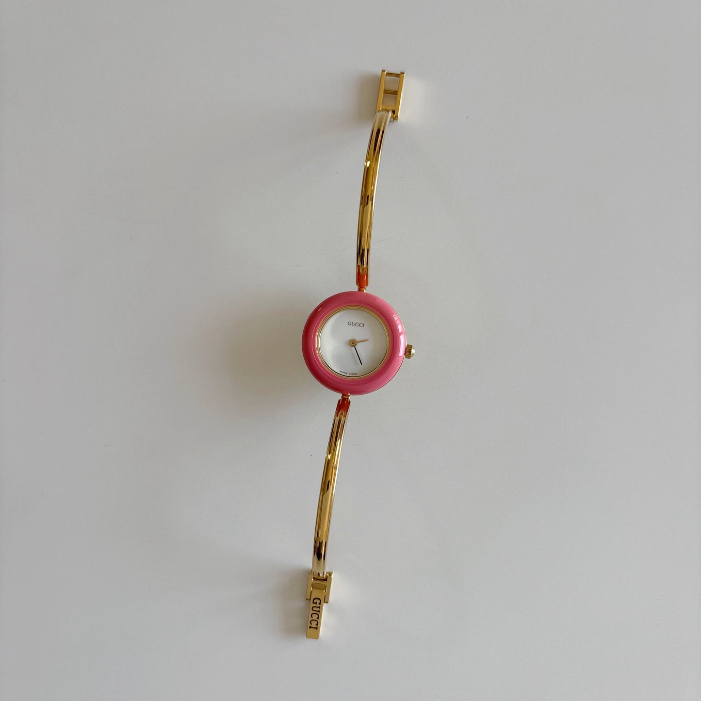 Gucci 1990s Interchangeable Bezel Gold Plated Bangle Watch with 12 bezels, case