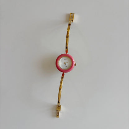 Gucci 1990s Interchangeable Bezel Gold Plated Bangle Watch with 12 bezels, case