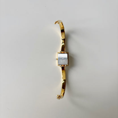 Yves Saint Laurent 1990s Seashell Dial Gold Plated Bangle Watch