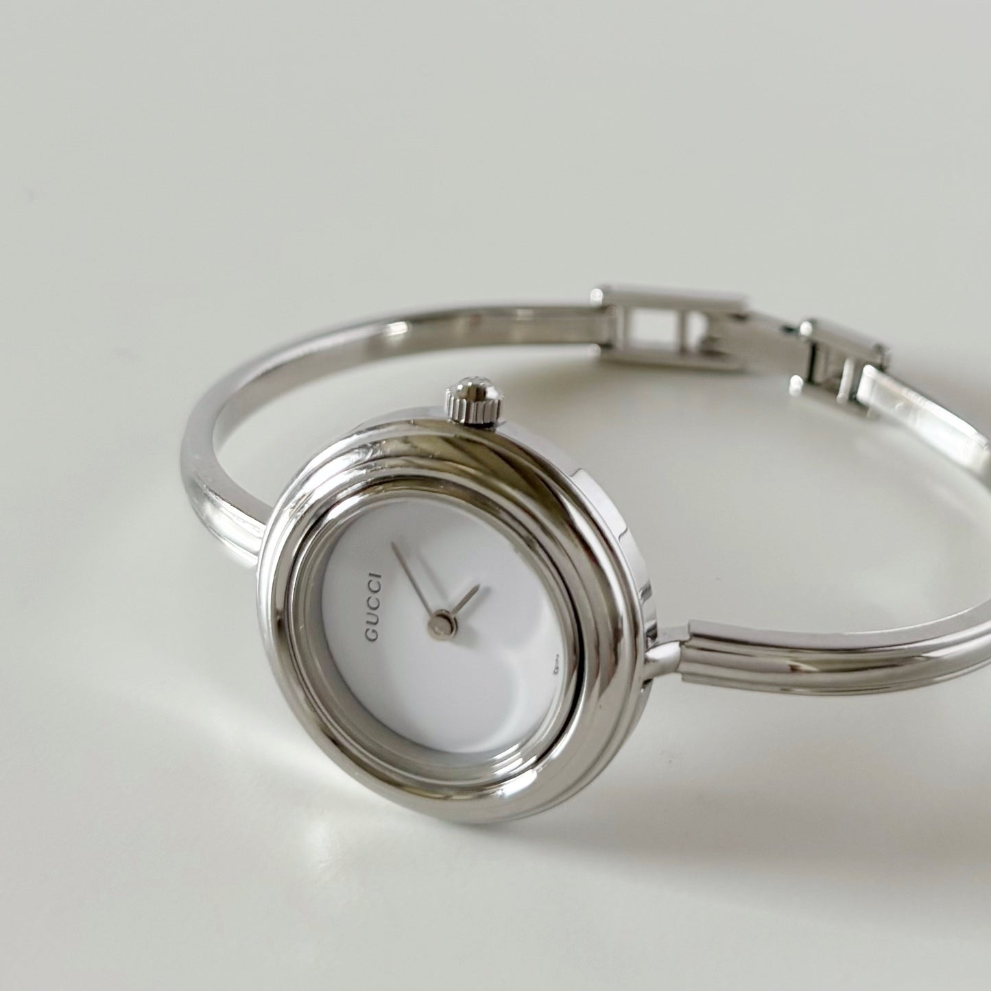 Gucci 1990s Interchangeable Bezel Stainless steel Bangle Watch with 12 bezels, case
