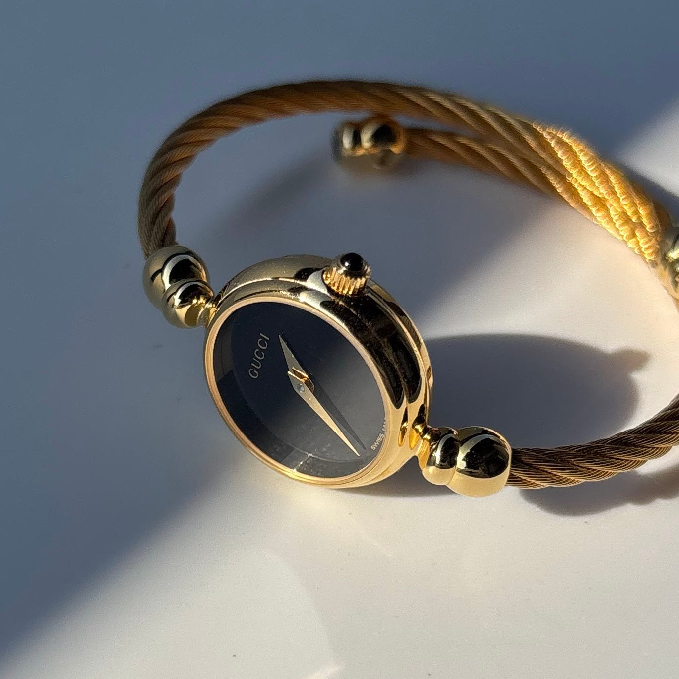 Gucci 1990s Black Dial Gold Plated Cable Band Bangle Watch