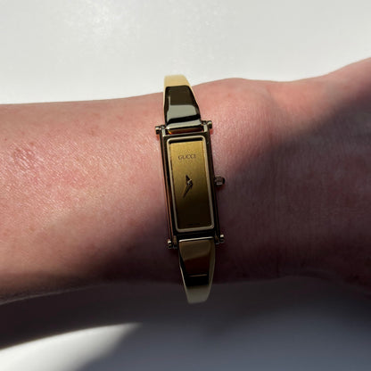 Gucci 1990s Gold Rectangular Dial Gold Plated Bangle Watch