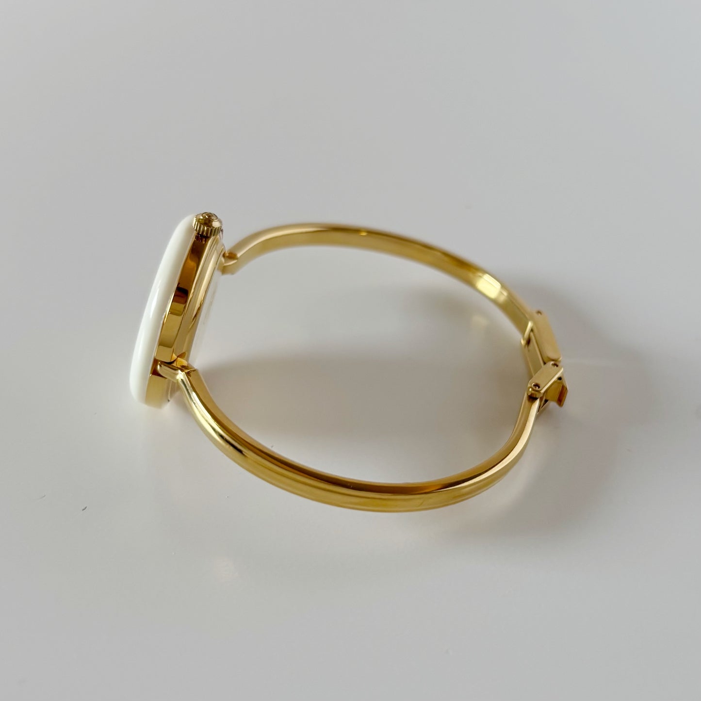 Gucci 1990s Interchangeable Bezel Gold Plated Bangle Watch with 12 bezels, case
