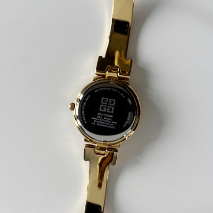 Givenchy 1990s Round Dial Gold Plated Bangle Watch