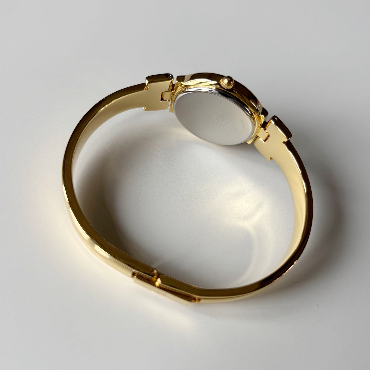 Givenchy 1990s Round Dial Gold Plated Bangle Watch