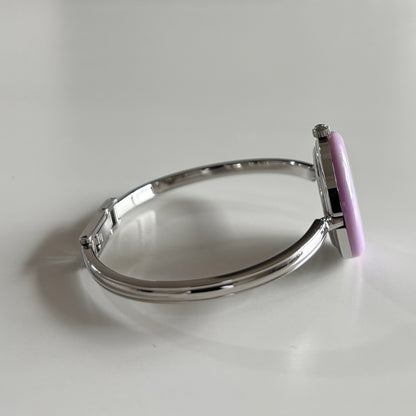 Gucci 1990s Interchangeable Bezel Stainless Steel Bangle Watch with 12 bezels, case
