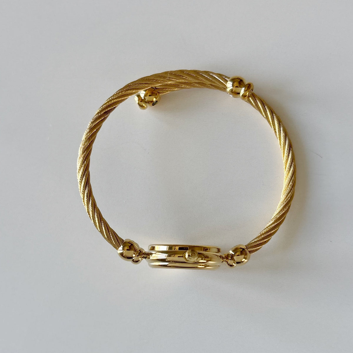 Gucci 1990s Black Round Dial Cable Gold-Plated Bangle Watch