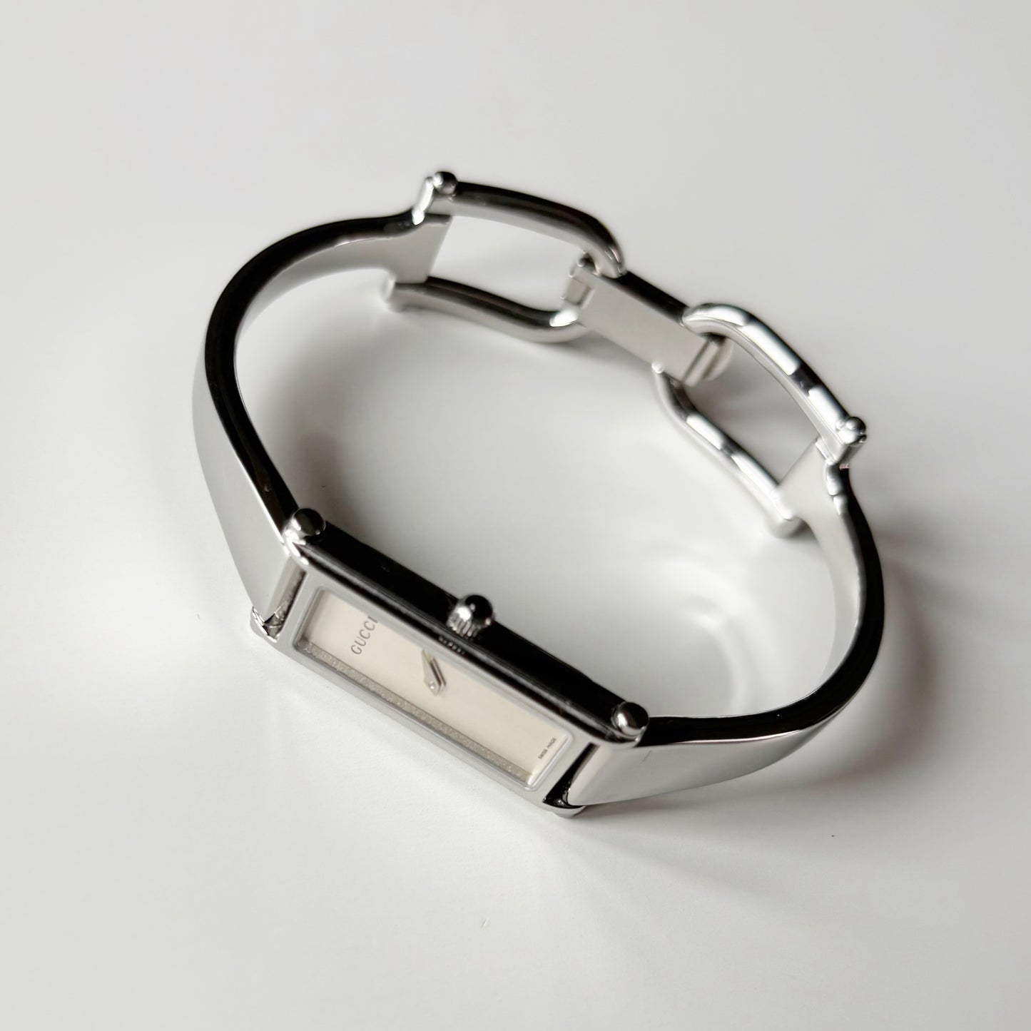Gucci 1990s Rectangular Dial Silver Bangle Watch