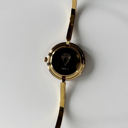 Gucci 1990s Interchangeable Bezel Gold Plated Bangle Watch with 12 bezels, case