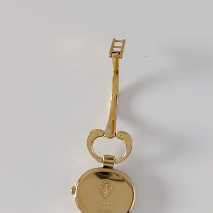 Gucci 1990s Seashell Oval Dial Gold-Plated Bangle Watch (Small)