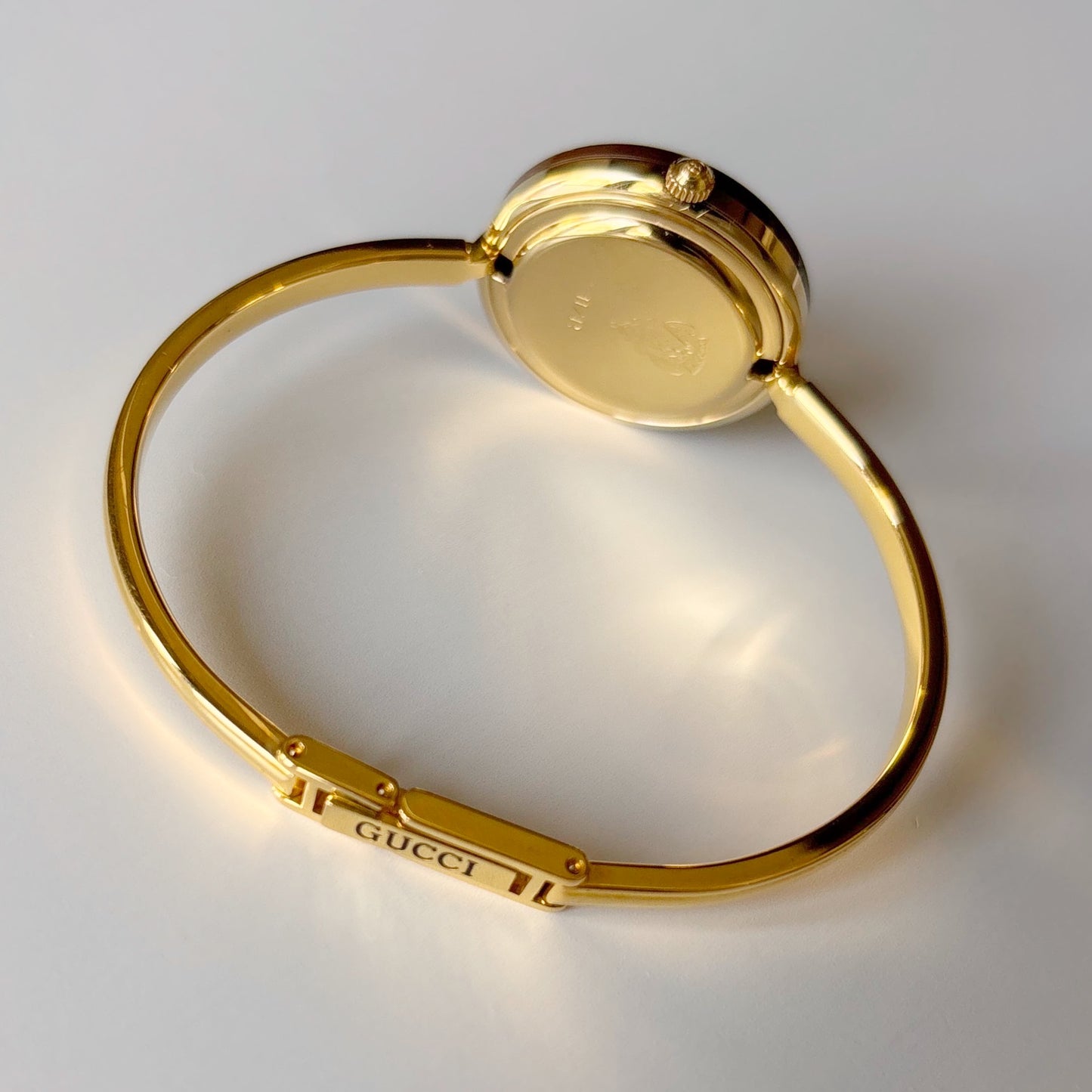 Gucci 1990s Interchangeable Bezel Gold Plated Bangle Watch with 12 bezels, case