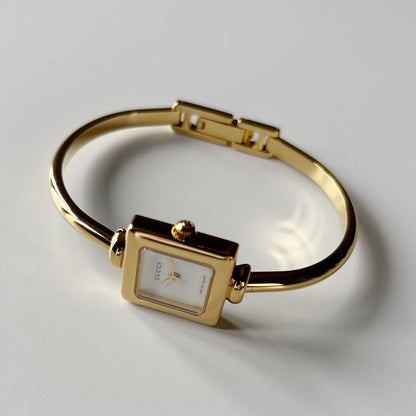 Gucci 1990s Square Dial Gold Plated Bangle Watch
