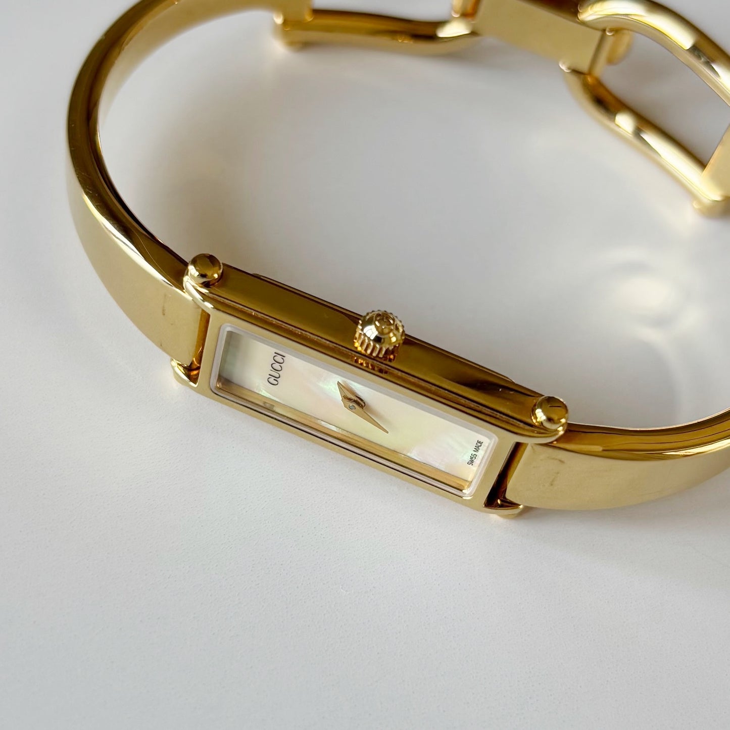 Gucci 1990s Seashell Rectangular Dial Gold Plated Bangle Watch