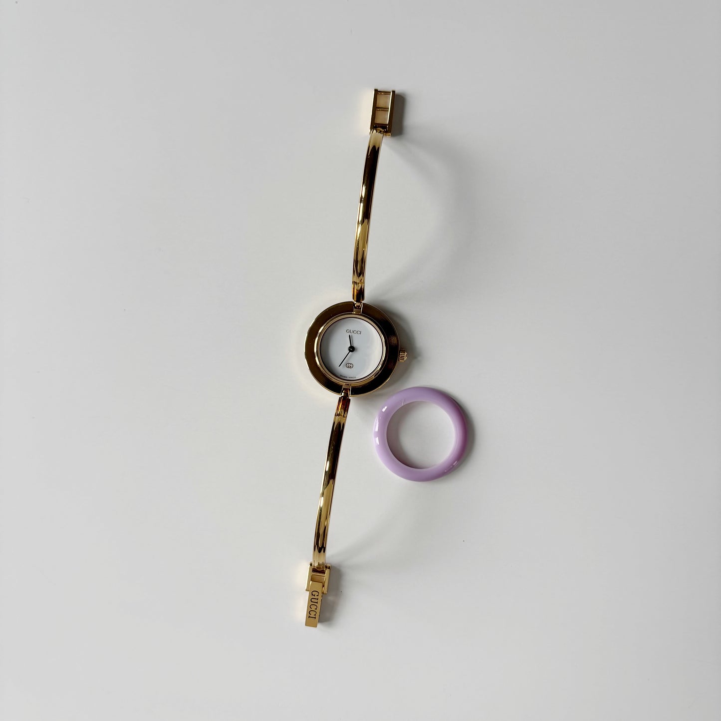 Gucci 1990s Interchangeable Bezel Gold Plated Bangle Watch with 12 bezels, case