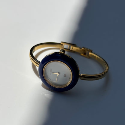 Gucci 1990s Interchangeable Bezel Gold Plated Bangle Watch with 12 bezels, case (Small)