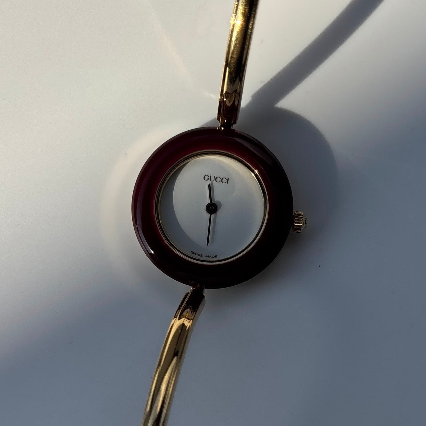 Gucci 1990s Interchangeable Bezel Gold Plated Bangle Watch with 12 bezels, case