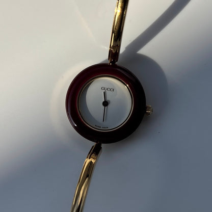 Gucci 1990s Interchangeable Bezel Gold Plated Bangle Watch with 12 bezels, case