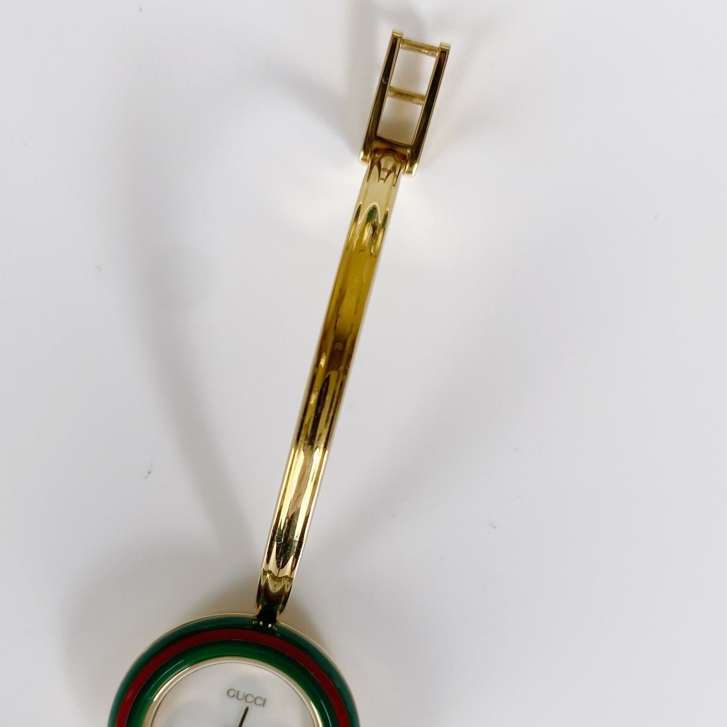 Gucci 1990s Interchangeable Bezel Gold Plated Bangle Watch with 12 bezels, case