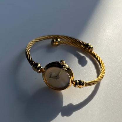 Gucci 1990s Seashell Dial Gold Plated Cable Bangle Watch