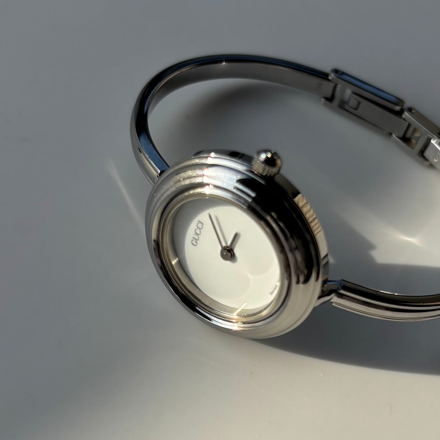 Gucci 1990s Interchangeable Bezel Stainless steel Bangle Watch with 12 bezels, case (Small)