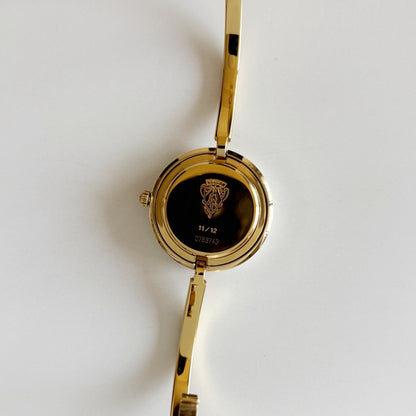 Gucci 1990s Interchangeable Bezel Gold Plated Bangle Watch with 12 bezels, case