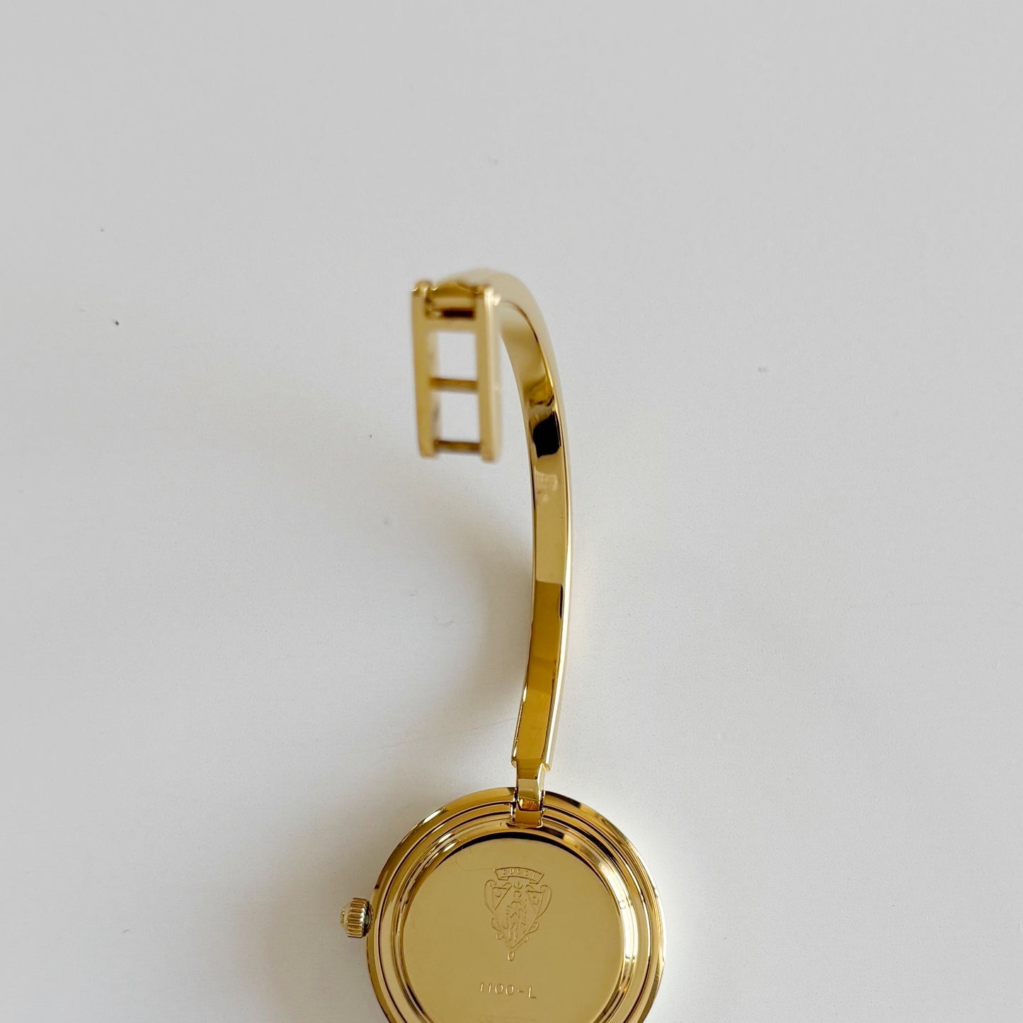 Gucci 1990s Interchangeable Bezel Gold Plated Bangle Watch with 12 bezels, case