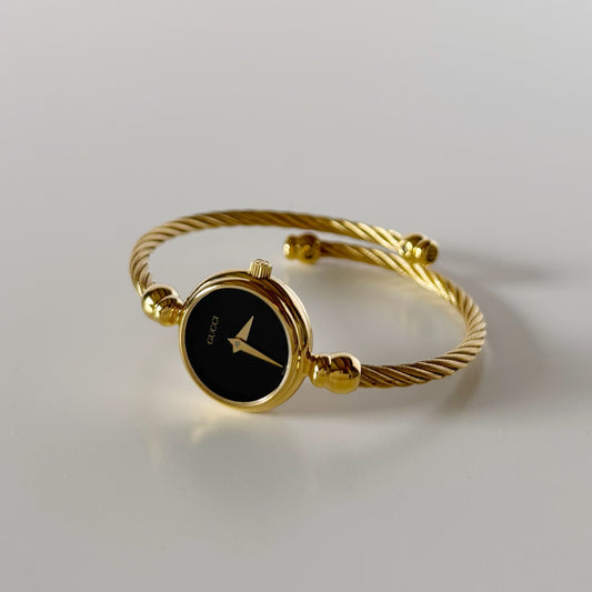 Gucci 1990s Black Dial Gold Plated Cable Bangle Watch