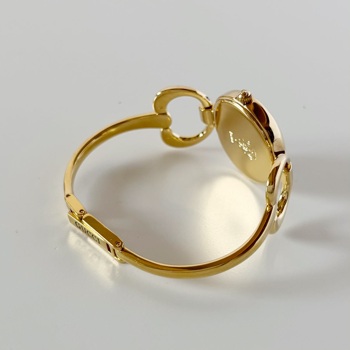 Gucci 1990s Seashell Oval Dial Gold-Plated Bangle Watch (Small)