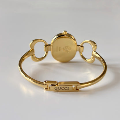 Gucci 1990s Oval Dial Gold Plated Bangle Watch