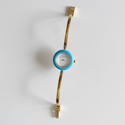 Gucci 1990s Interchangeable Bezel Gold Plated Bangle Watch with 12 bezels, case