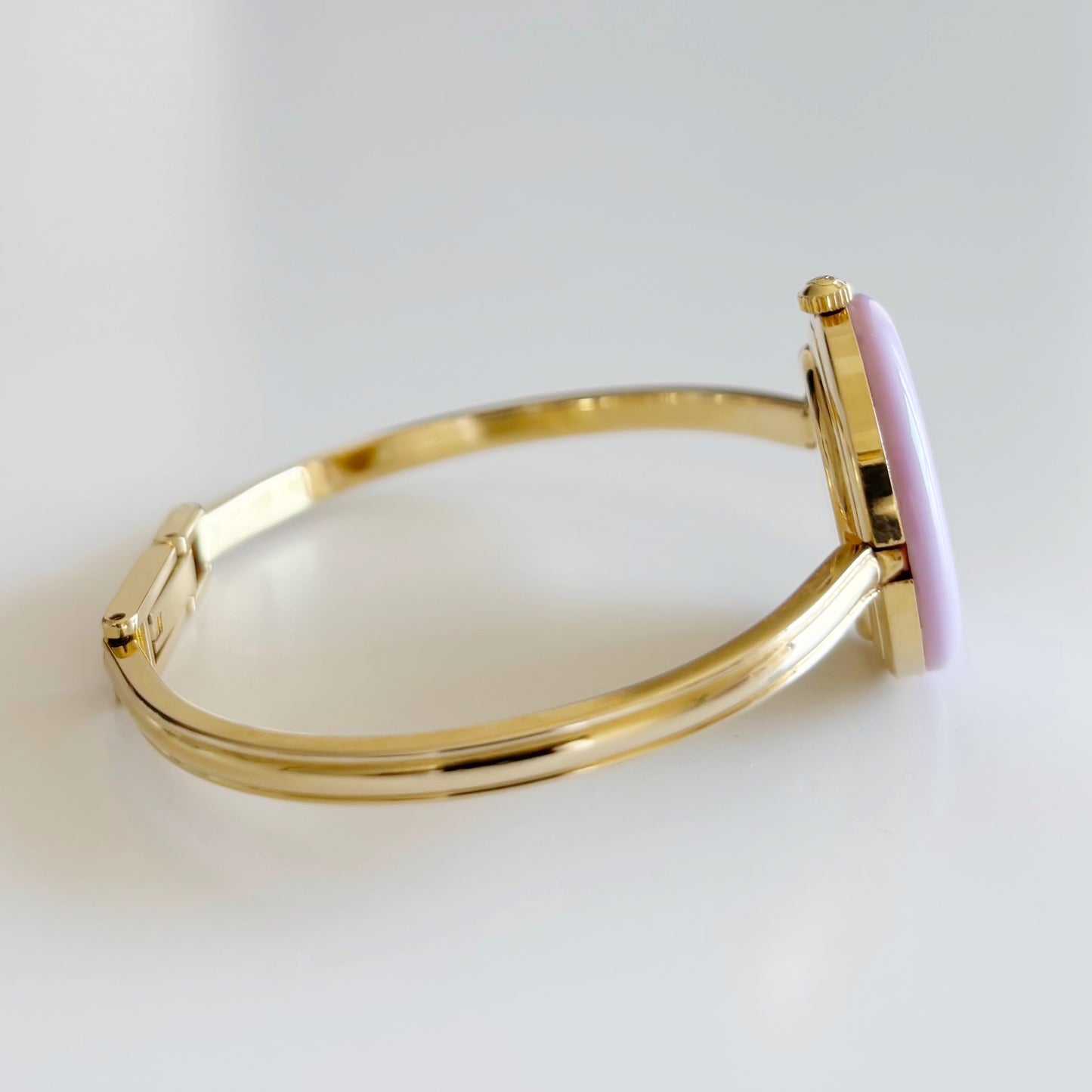 Gucci 1990s Interchangeable Bezel Gold Plated Bangle Watch with 12 bezels, case