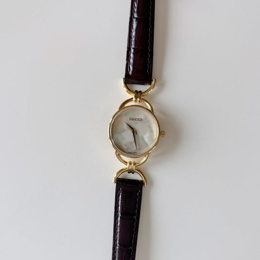Gucci 1990s Seashell Dial Horsebit Gold Plated Watch