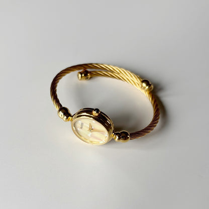 Gucci 1990s Seashell Dial Gold Plated Cable Bangle Watch