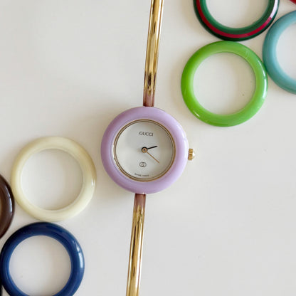 Gucci 1990s Interchangeable Bezel Gold Plated Bangle Watch with 12 bezels, case