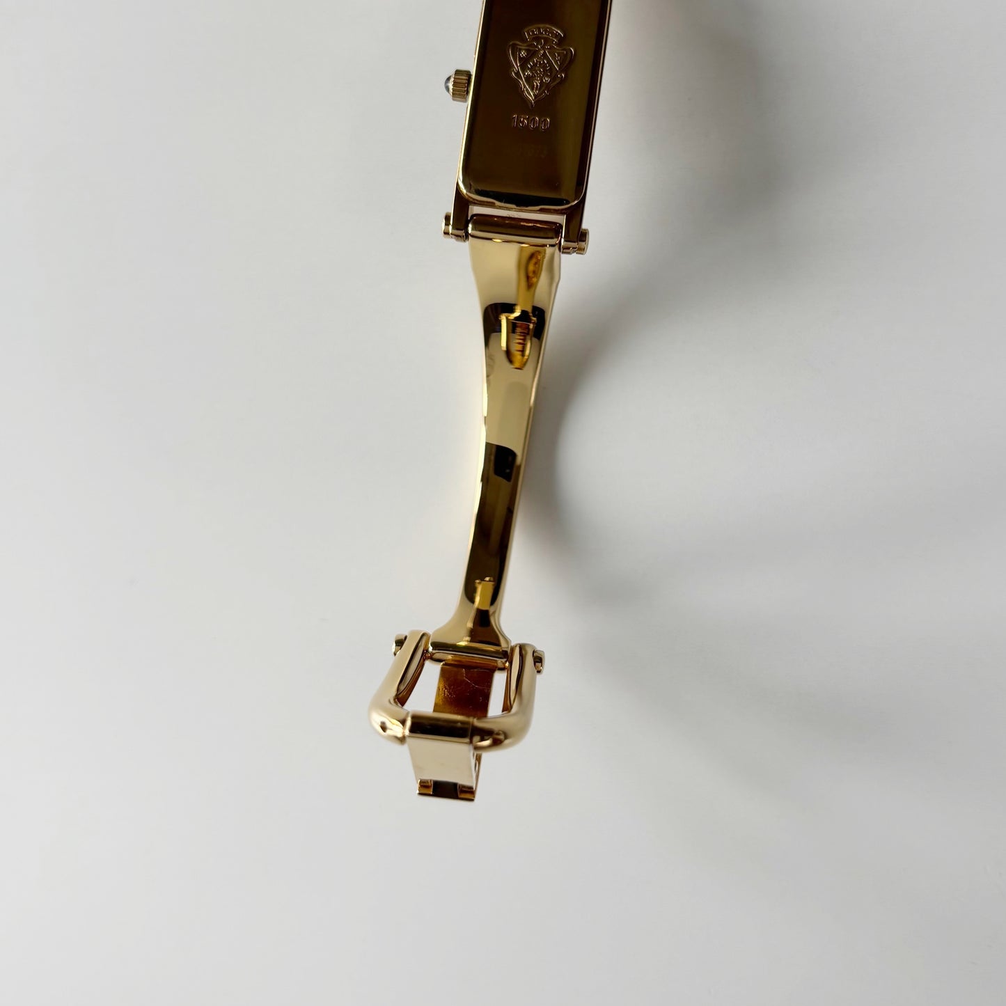 Gucci 1990s Gold Rectangular Dial Gold Plated Bangle Watch
