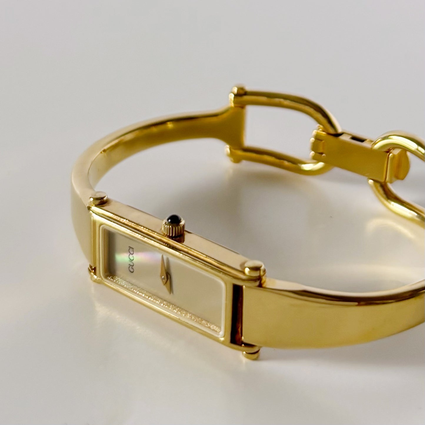 Gucci 1990s Rectangular Seashell Dial Gold Plated Bangle Watch