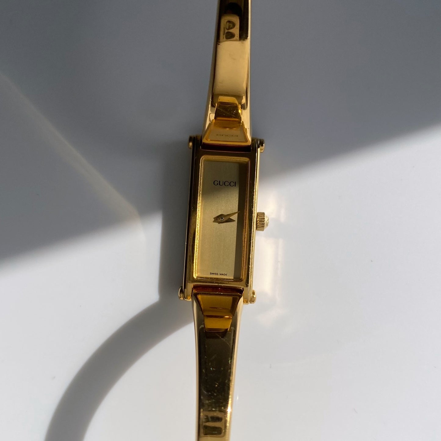 Gucci 1990s Gold Dial Rectangular  Gold Plated Bangle Watch