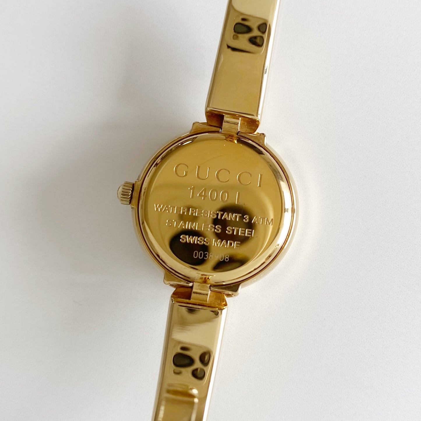 Gucci 1990s Round Dial Gold Plated Bangle Watch