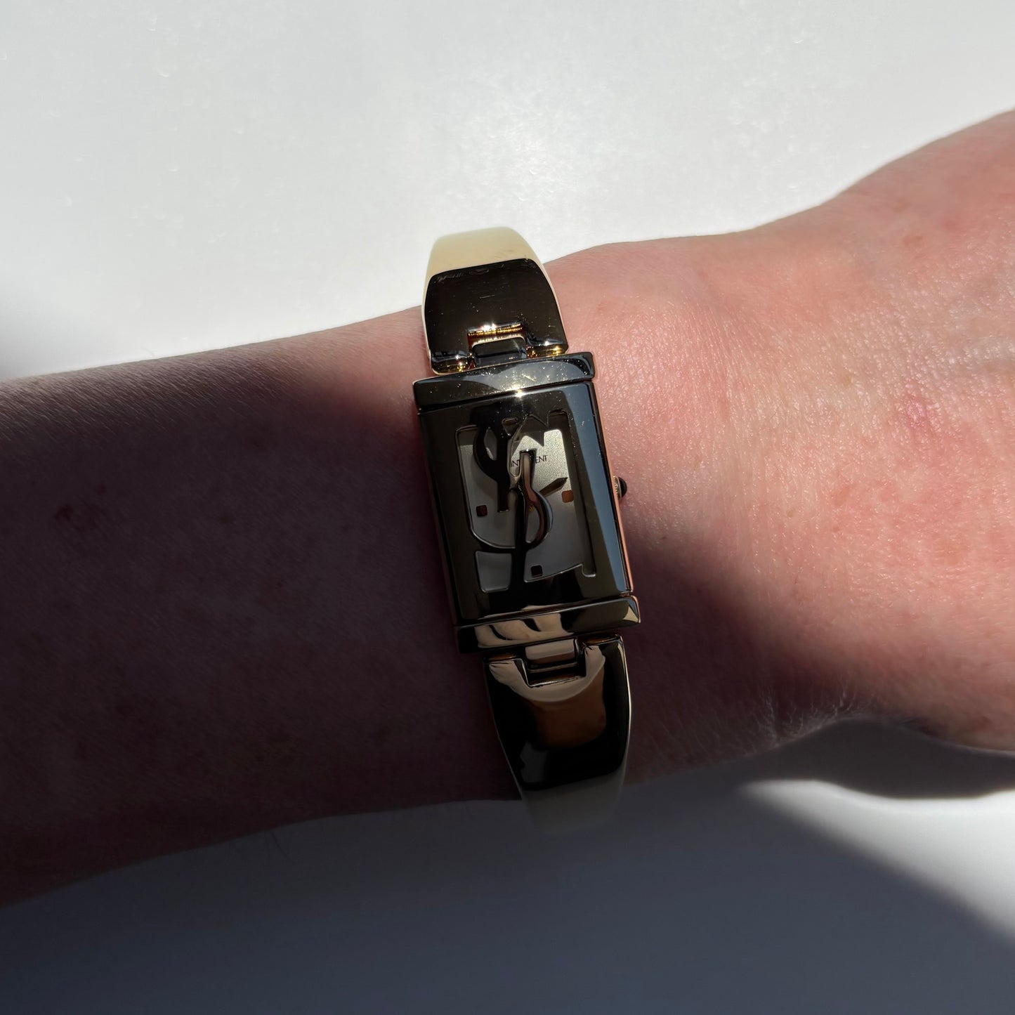 Yves Saint Laurent 1990s Peek-A-Boo Gold Plated Bangle Watch