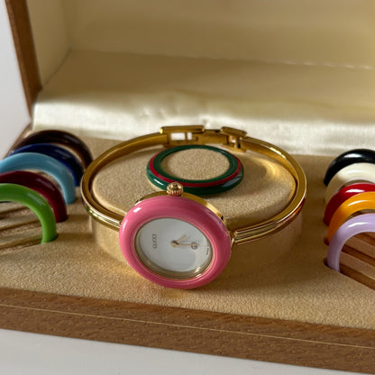 Gucci 1990s Interchangeable Bezel Gold Plated Bangle Watch with 12 bezels, case (Small)