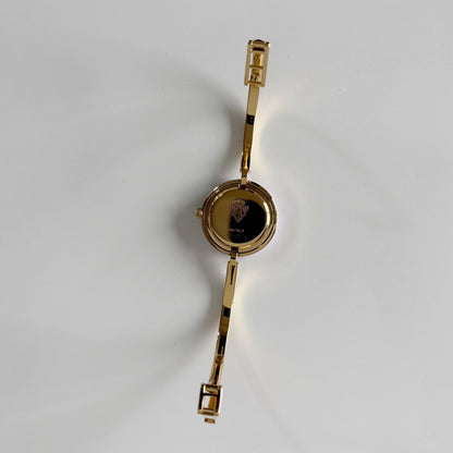 Gucci 1990s Interchangeable Bezel Gold Plated Bangle Watch with 12 bezels, case