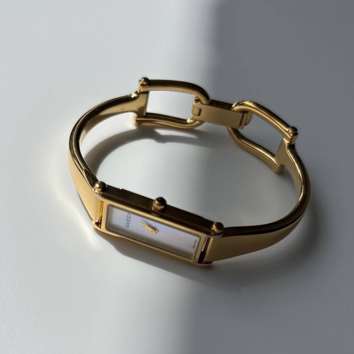 Gucci 1990s Seashell Dial Rectangular Gold-Plated Bangle Watch