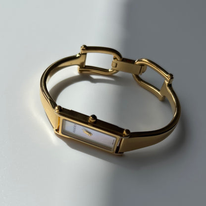 Gucci 1990s Seashell Dial Rectangular Gold-Plated Bangle Watch
