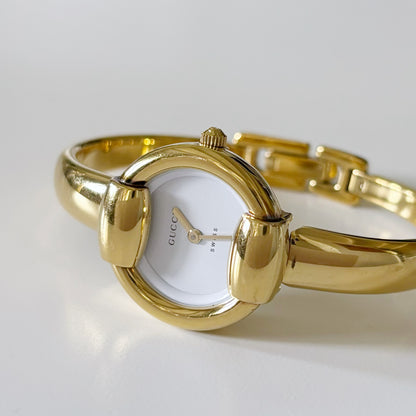 Gucci 1990s Gold Plated Round Bangle Watch