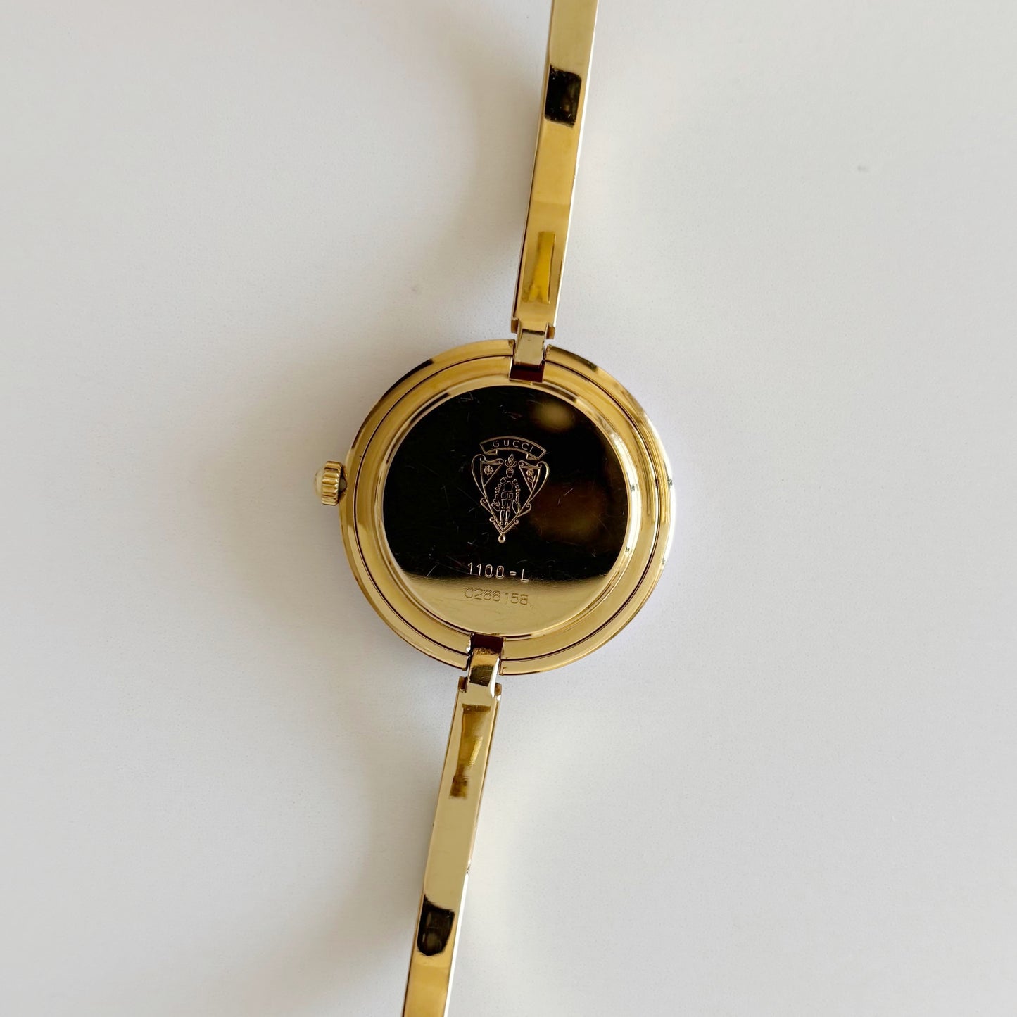 Gucci 1990s Interchangeable Bezel Gold Plated Bangle Watch with 12 bezels, case